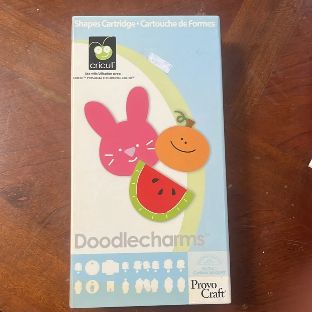 Cricut cartridge. Doodlecharms. Linked
